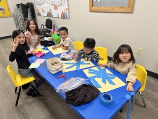 Families from our church community sharing a meal.