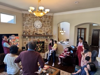Members sharing a meal in fellowship.